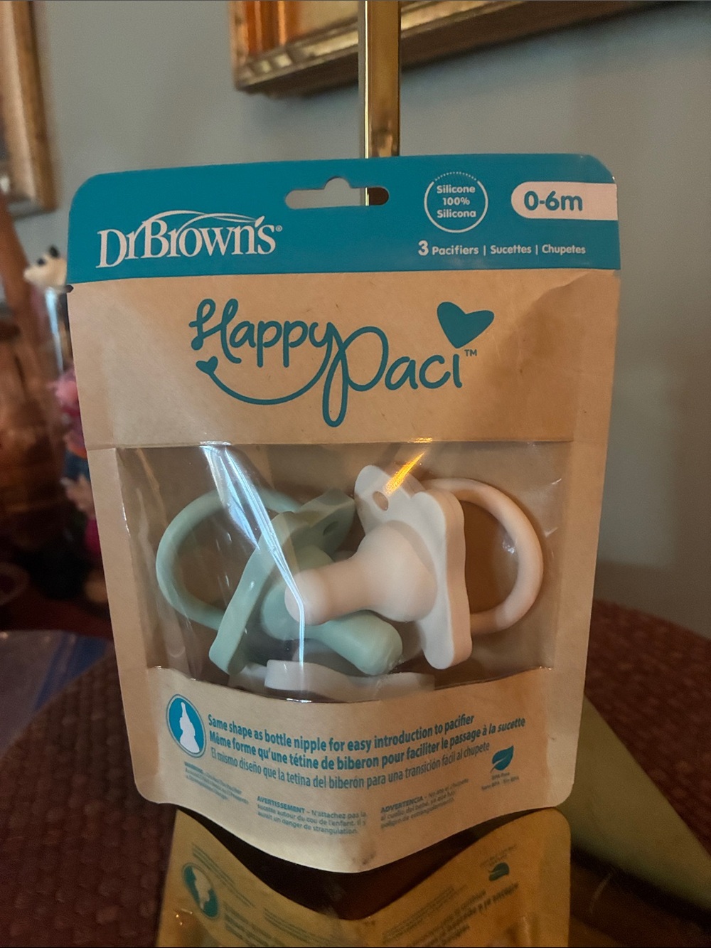 Dr. Browns Happy Paci Set of Three Pacifiers with Bottle Shaped Nipples.